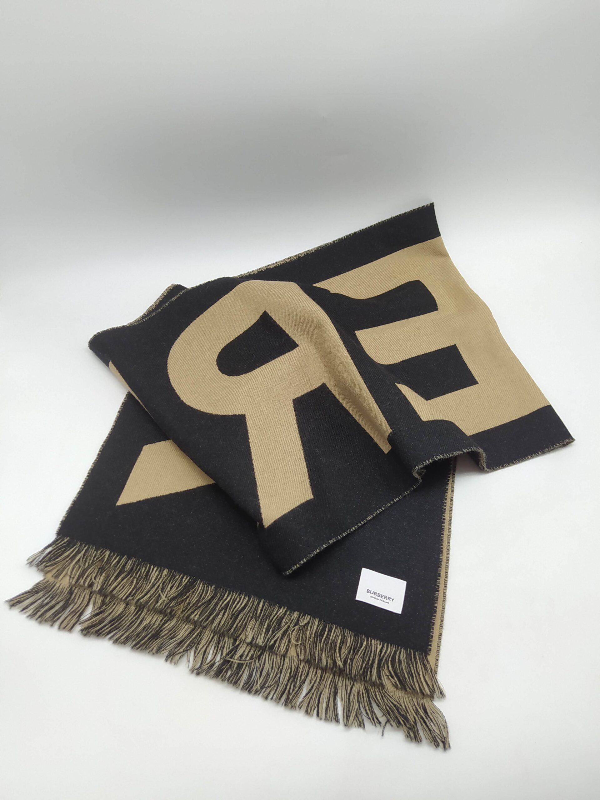 black and beige Burberry scarf